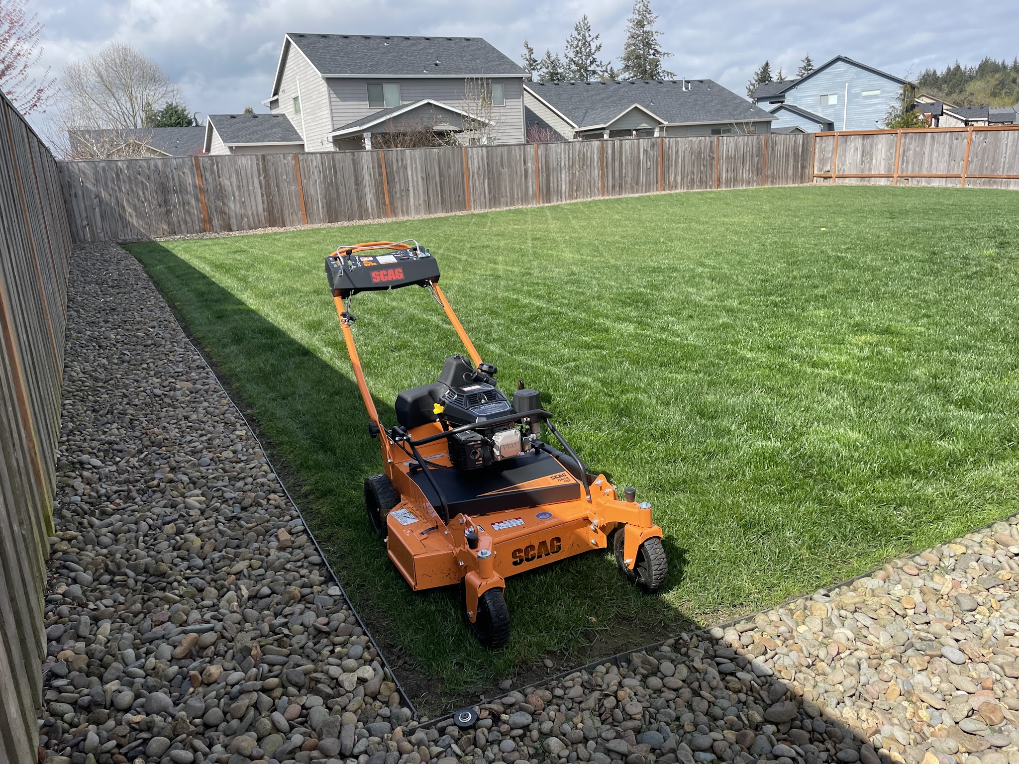 Professional mower on a freshly cut lawn by Mid Valley Lawn Care